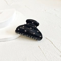 Close-up of black glossy hair claw with sparkling rhinestones on textured background - 6.5*4*4.5cm / Black Small