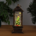 Macro detail of a bronze lighted Christmas lantern featuring a snowy tree decoration inside - Bronze Lantern Christmas Tree (Water Injection)