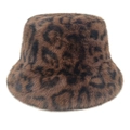 Detail shot of the plush leopard print faux fur texture on a winter bucket hat - Light Coffee