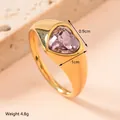 Macro detail of 4.8g gold-plated signet ring featuring a pink heart-shaped zircon gemstone - US 8 / Deep Pink
