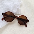 Elegant round-frame sunglasses with dark tawny transparent frames and brown lenses - Transparent Dark Tea