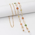 Golden eyewear chain featuring colorful enamel flowers and multifaceted glass beads - 70cm / Bezel Glass Mixed Flowers