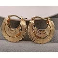 Detail of gold hoop earrings with radial textured engraving and cutout patterns - Gold Large Hoop Fan Texture