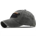 Close-up of gray washed cotton baseball cap with orange Hawaii embroidery and black lettering - Adjustable / Army Green