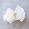 Baby lace headband in white with large bow featuring central pearl and rhinestone - White Lace With Rhinestones