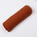 Solid caramel voile scarf with fringe edges and cotton linen texture on white background - Khaki/Earth Yellow