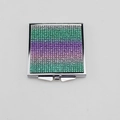 Close-up of square metal portable mirror with green and purple gradient rhinestones - Violet