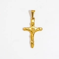 Macro shot of gold cross pendant with Jesus crucifix detail and polished finish - Cross - Gold