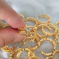 Detailed macro of gold-plated lace rings with cubic zirconia and adjustable open band - Adjustable Open / Gold