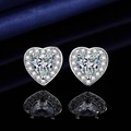 Elegant silver heart-shaped stud earrings with sparkling cubic zirconia on a black surface - White Diamond Heart-shaped Earrings Led-72