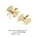 Detail of gold bow pendant with zircon inlays and copper material specifications - Bow (3)
