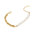 Baroque pearl bracelet with chunky gold cable chain and 18K tag on white background - Thick Twisted Chain Pearl Splicing Bracelet