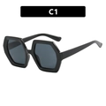 Occhiali da sole esagonali neri oversize con lenti scure e montatura spessa lucida - Nero Lucido / Grigio