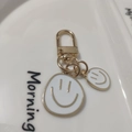Golden alloy keychain with two white enamel smiley face charms and lobster clasp - Small & Large Set White