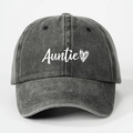 Detailed close-up of embroidered Auntie text and heart on washed cotton baseball cap - One Size / Black