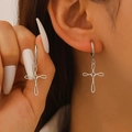 Detailed view of silver stainless steel cross earrings with small hoop and hollow pendant - Hollow Cross Earrings (DZ-950) / Steel