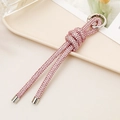 Pink rhinestone knotted car keychain with silver ring on a beige tray display - Knot Rhinestone Chain Pendant / Pink