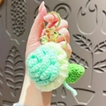 Handmade mint green crochet flower keychain with golden bell and lobster clasp accessory - Light Blue