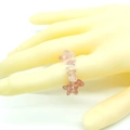 Elastic beaded ring featuring pink and transparent star-shaped natural stones for women - Strawberry Quartz