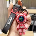 Pink astronaut keychain with mask lettering and black silicone strap for car or bag - Large Lightning Bear--Red