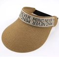 Detail of woven straw sun hat with 'NEVER MIND' ribbon and adjustable elastic band - Khaki