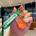 Green Mickey-shaped liquid sand keychain with colorful beads and Good Luck wristband - Mickey Head Shaker - Orange