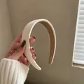 Thick cream beige padded headband with textured fabric and dark brown lining for women - Off White