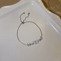 Silver butterfly pearl bracelet with zircon accents and an adjustable slider chain - S321 Silver