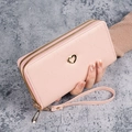 Pink faux leather long wallet for women with geometric embossing and heart charm - Pink