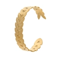 Elegant gold titanium steel open bangle featuring intricate engraved leaf patterns - Y538-1 Gold Leaf Carved