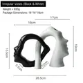 Abstract face ceramic bookends in black and white finish with size measurements - Mutually Compatible Vase - Black And White