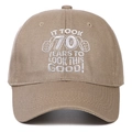 Close-up of khaki cotton baseball cap with 70th birthday embroidery on front - Khaki