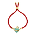 Close-up of red woven cord bracelet featuring turquoise heart with golden crown and cross - Green
