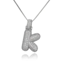 Macro shot of silver letter K pendant with micro-pave cubic zirconia on box chain - Letter K (DX34-K)