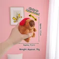 Capybara plush keychain with red hat and sound feature, dimensions 12.5cm by 9.5cm - Red Earphones Strange Howl Capybara