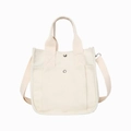 Minimalist beige canvas crossbody bag with adjustable strap and silver metal snap buttons - White