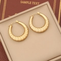 Detailed view of gold geometric stainless steel hoop earrings with textured wheat pattern - Wheat Grain Pattern Style (6#)