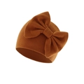 Close-up of caramel knitted baby hat with a large decorative bow on a white background - Caramel (Bow Turban Hat)