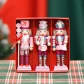 Set di 3 schiaccianoci in legno rosa a tema dolci in confezione regalo rossa - Set di 3 Torta di Caramelle Rosa