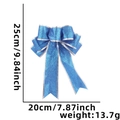 Blue glitter Christmas bow decoration with silver edges and 25cm size measurements - Blue