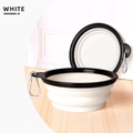Portable white collapsible pet bowl with black rim and a silver metal carabiner clip - White