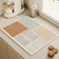 Kitchen draining mat with beige and brown geometric abstract pattern on countertop - Irregular Lines