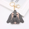 Detail of beagle dog leather keychain with grey and pink panels and golden hardware - Dark Gray