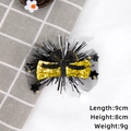 Detail of graduation hair clip with black mesh, gold scroll and tassel decorations - Gold Graduation Certificate