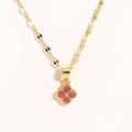 Detail of gold four-leaf clover necklace with pink gems and textured flat link chain - Four-Leaf Clover Purple