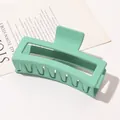 Detail of matte mint green hollow hair claw clip with strong spring and multi-tooth design - 13cm Rectangular - Matte Lake Green