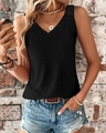 Detail of delicate hollow lace embroidery on black V-neck sleeveless top for women - S / Black
