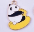 Panda enamel pendant charm on a yellow banana base with golden metal edges - Panda Riding Rocking Horse