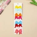 Set of 10 colorful ribbon bow hair clips for girls arranged on a white display card - Candy Colors Vibrant Mixed (#31)