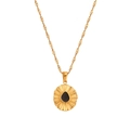 Collier doré avec pendentif soleil, centre goutte noire et chaîne torsadée - Collier / Or/Noir